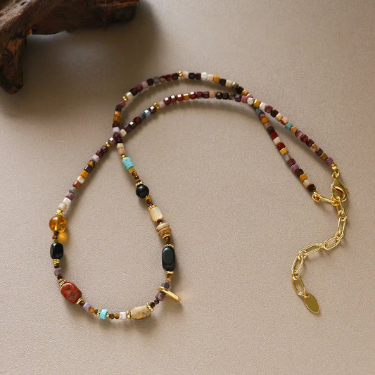 Boho multicolor stone beaded necklace with brass accents and adjustable gold chain