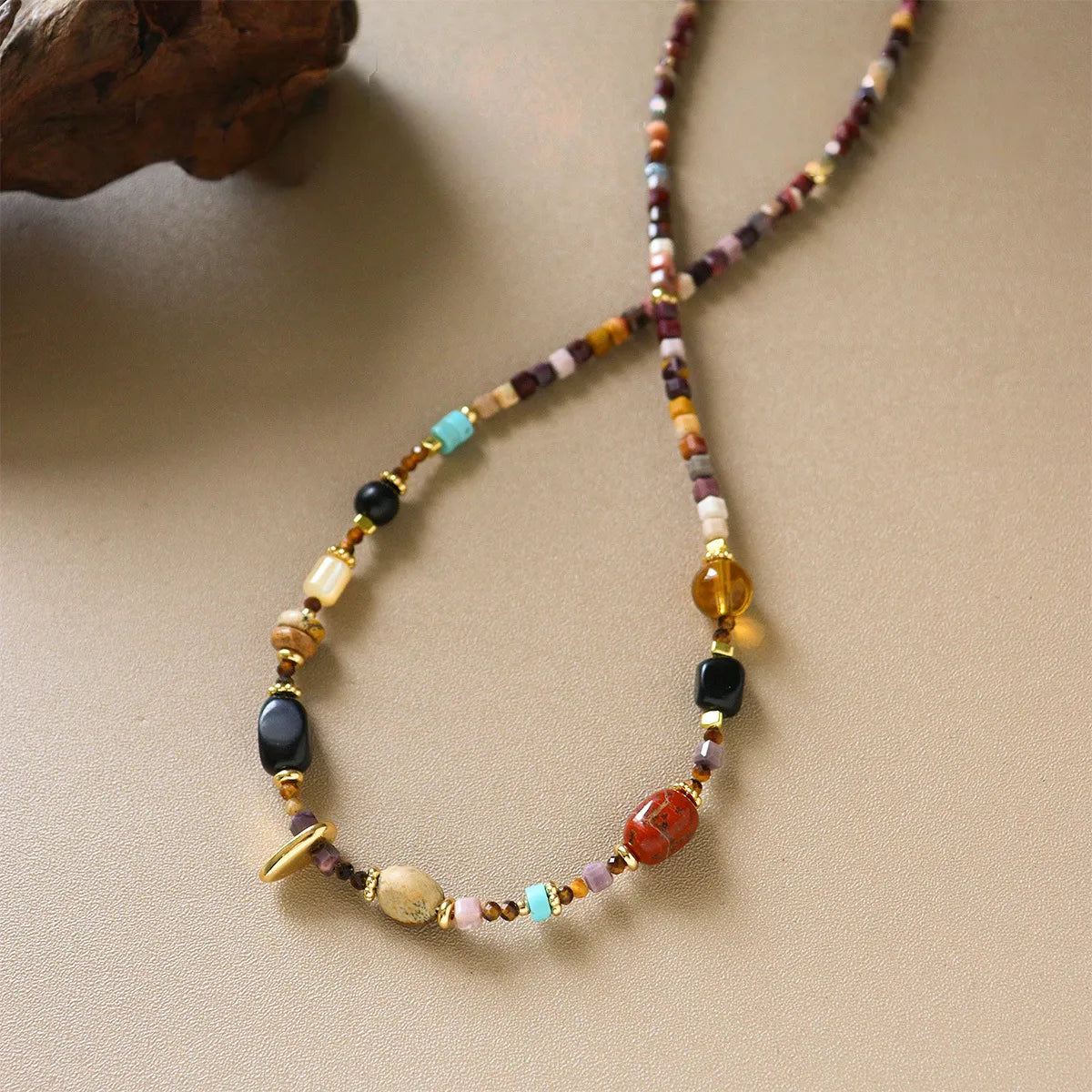 Vintage boho beaded necklace with natural stone beads, turquoise accents and brass details