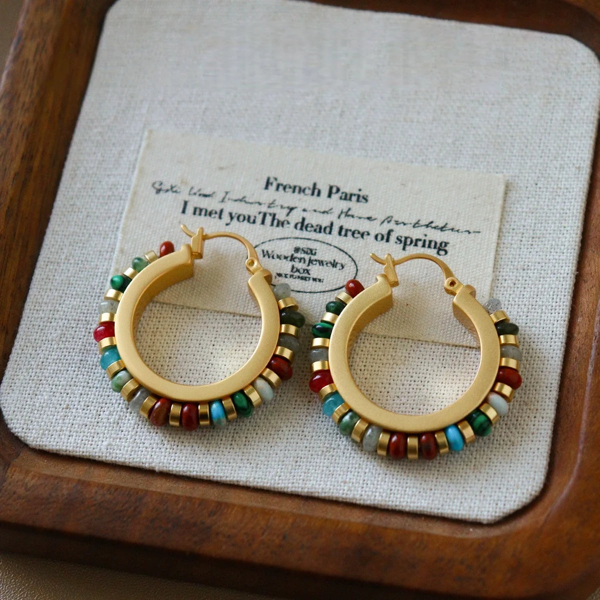 Natural stone hoop earrings with turquoise, red and colorful beads in vintage boho style