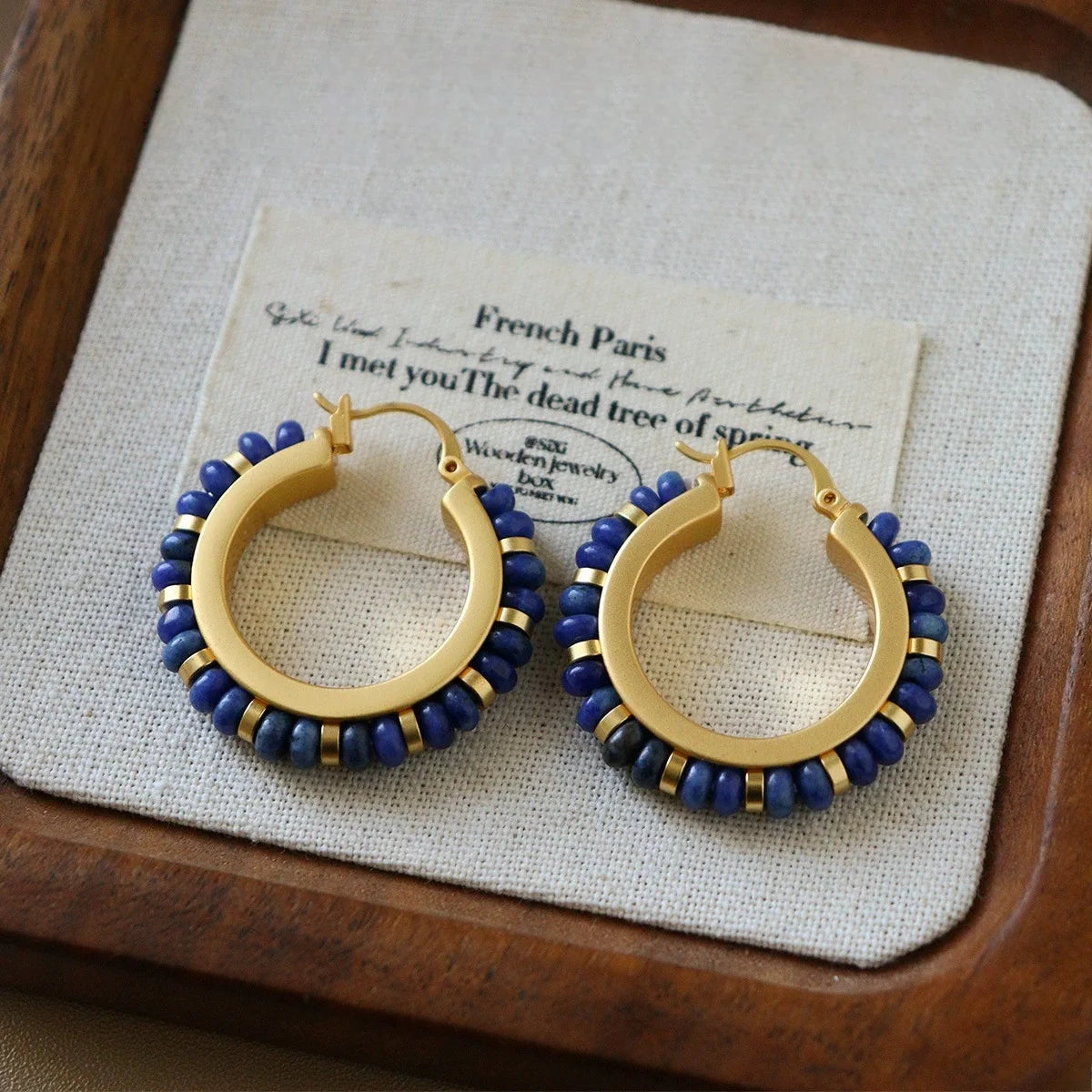 Lapis lazuli beaded hoop earrings with gold tone copper and boho gemstone design