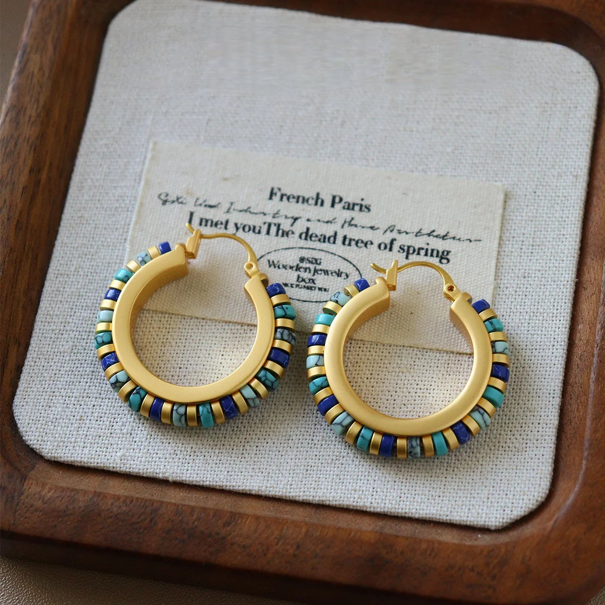 Turquoise stone hoop earrings with gold tone copper and colorful beaded boho details