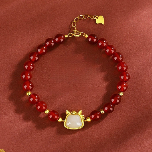 Red agate white jade horse bracelet with adjustable S925 extender chain.